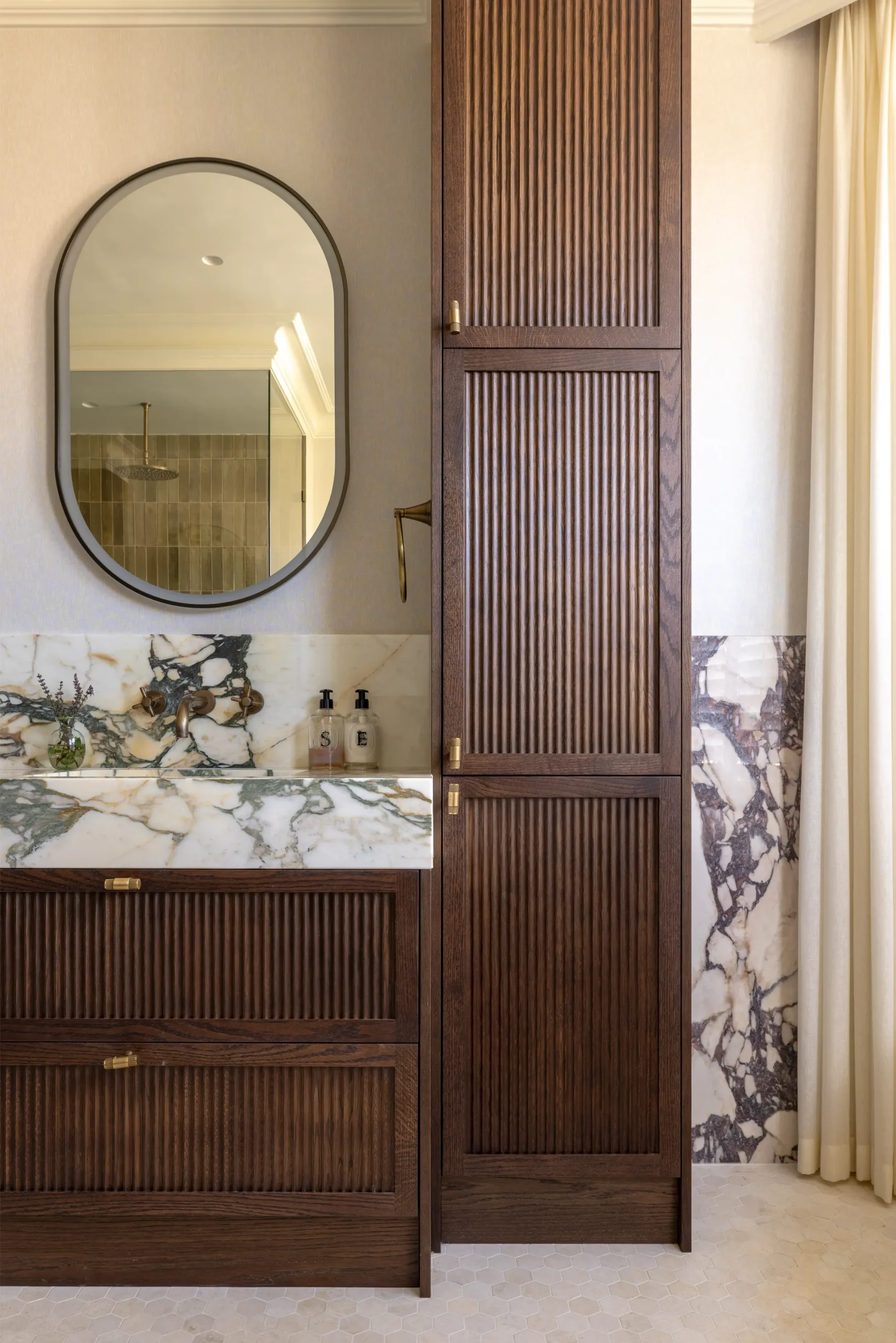 Project London Dubai bathroom with stone vanity, timber cabinetry and elegant interior styling