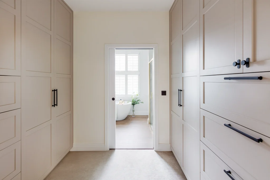 London dressing room in Fulham Broadway with built-in wardrobes and bathroom view design