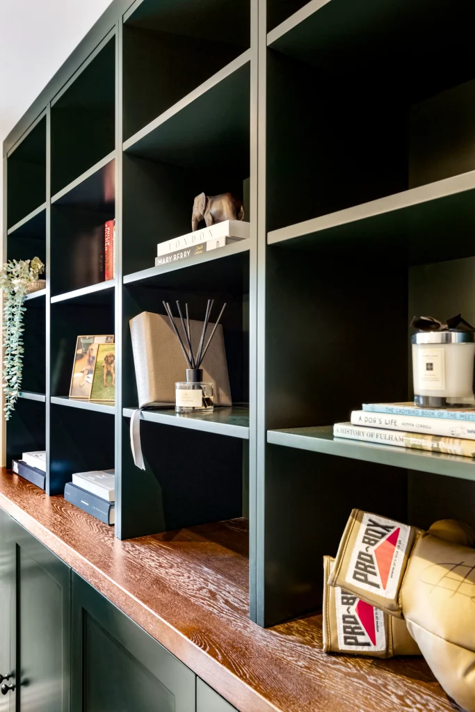 London interior in Fulham Broadway with fitted shelving, cabinetry and decorative styling design