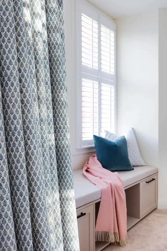 London interior in Fulham Broadway with window seat, fitted storage and patterned curtains design