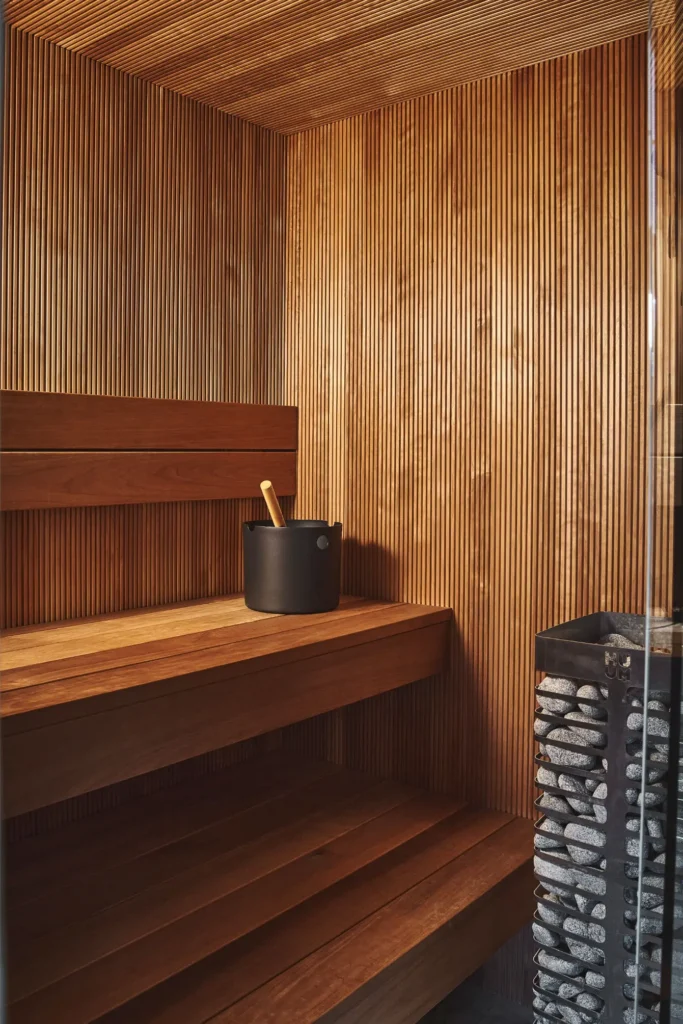 Luxury sauna interior in Portobello Road London with timber panel walls and minimalist design